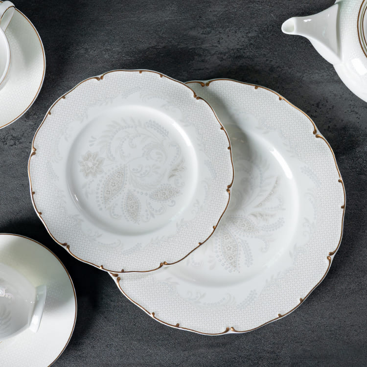 A pair of exquisite bone china plates from the P&T Royal Ware Floral Dinnerware Set, featuring delicate floral patterns and gold rims—perfect for elegant dining in hotels, restaurants, and upscale events.