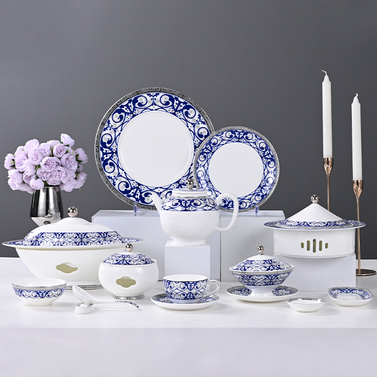 This image showcases an exquisite blue and white bone china dinnerware set, meticulously designed to elevate the dining experience in upscale hotels and restaurants.