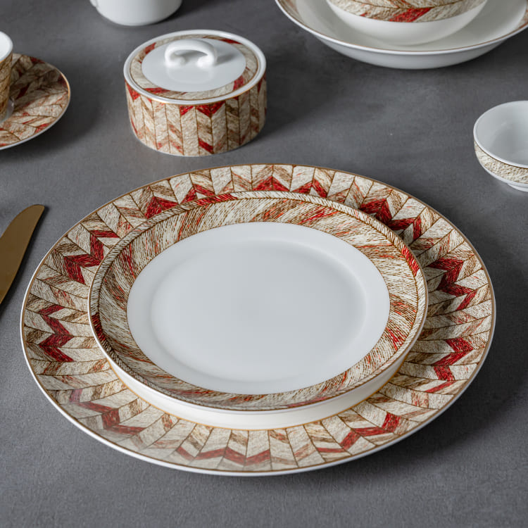 This image presents a complete arrangement of the luxury modern dinnerware set, showcasing the harmonious design and intricate patterns that adorn each piece.
