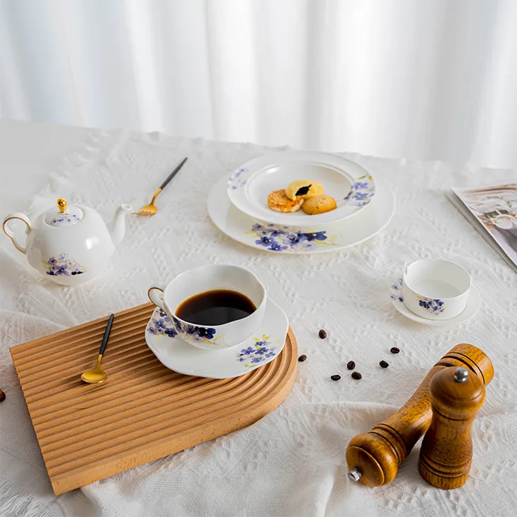 This image showcases an elegant dining arrangement featuring the blue floral bone china collection.