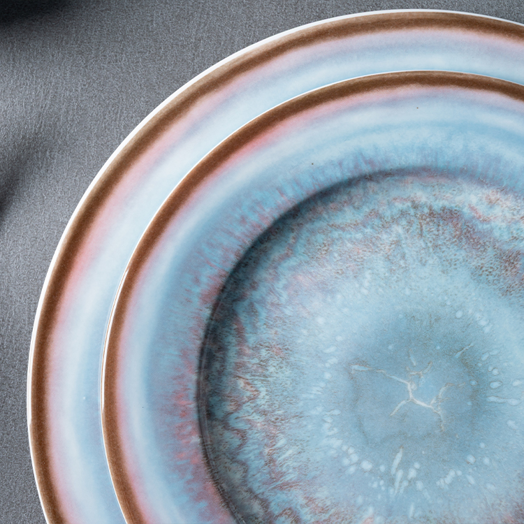 This close-up image highlights the intricate design of a porcelain plate, part of a premium dinnerware collection.