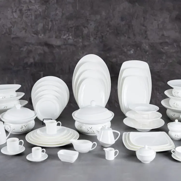 This image presents an extensive collection of fine porcelain dinnerware, meticulously arranged to showcase the variety and completeness of the set.