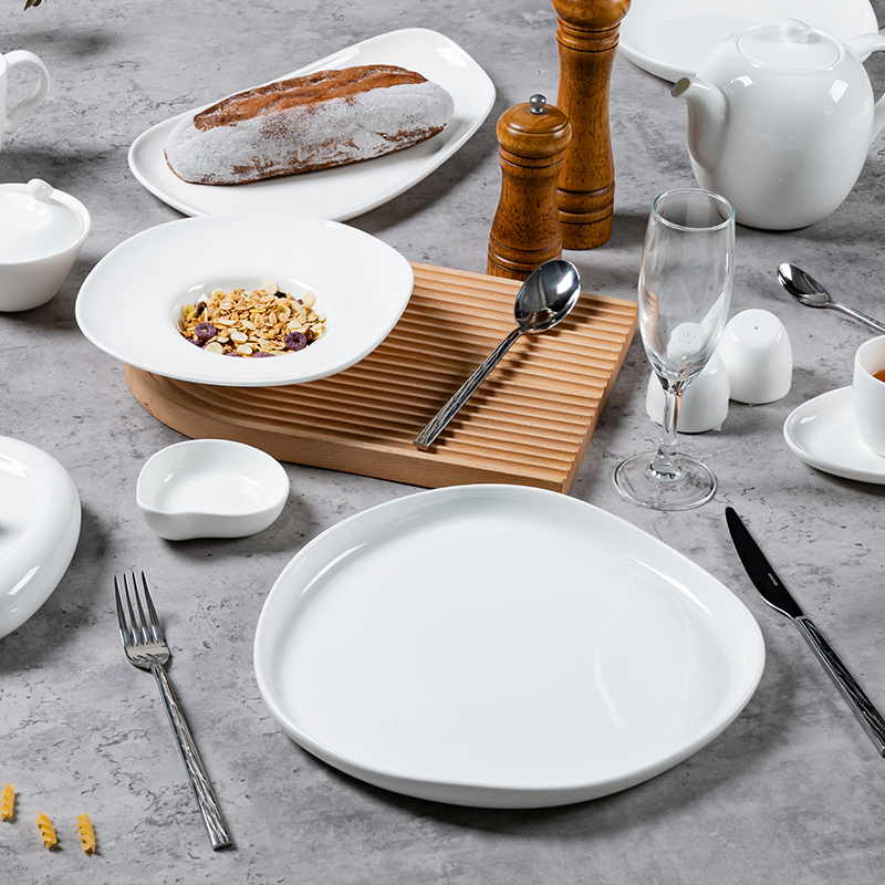 The image depicts an elegant breakfast setting featuring fine porcelain tableware.