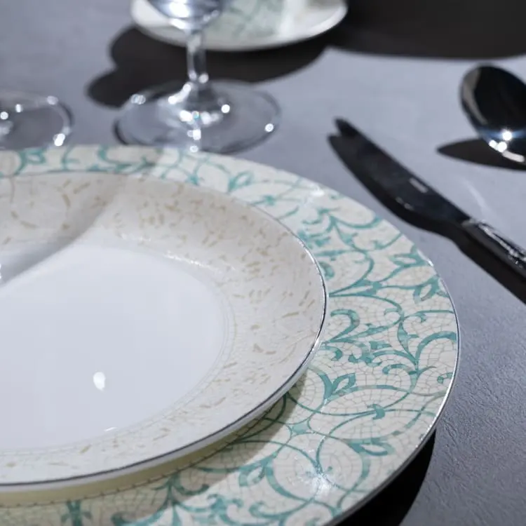 This image showcases a beautifully crafted floral dinner plate, designed with intricate patterns that exude sophistication and elegance.