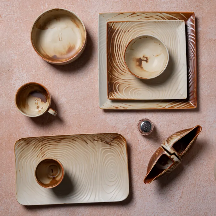 This image features a complete collection of Nordic style tableware, including square and rectangular plates, bowls, a cup, and a sauce dish.