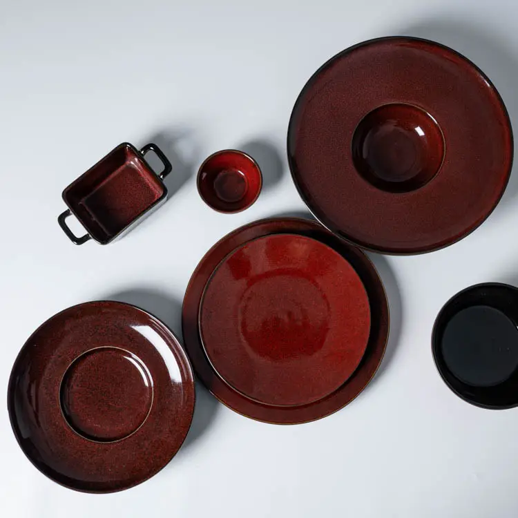 This image showcases a selection of the crimson red porcelain dish set, highlighting its elegant and sophisticated design.