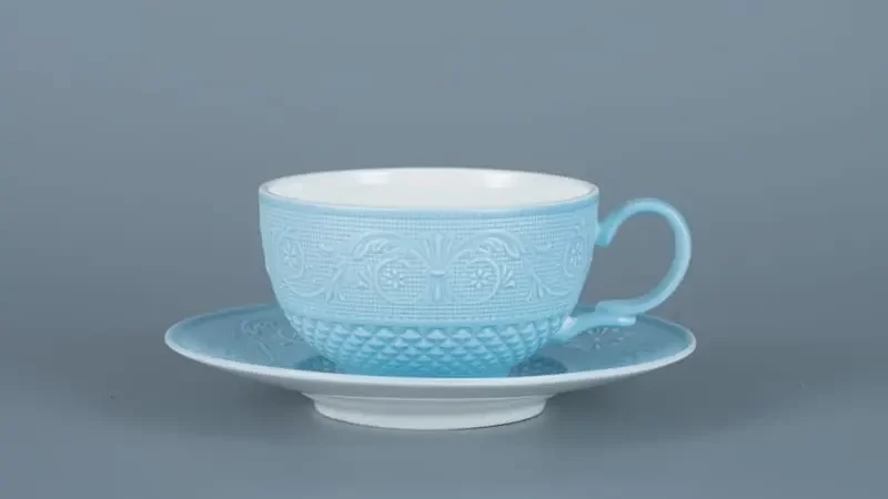 Fine bone china tea set with teacup, saucer, and teapot